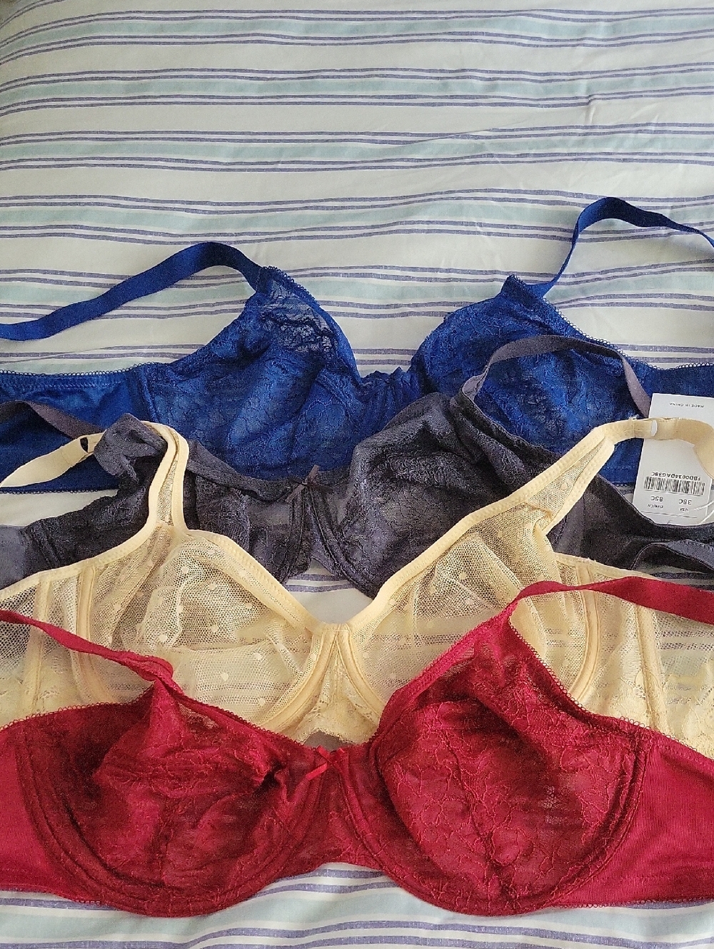 4 Lace Bras in Red, Blue, Cream, and Gray